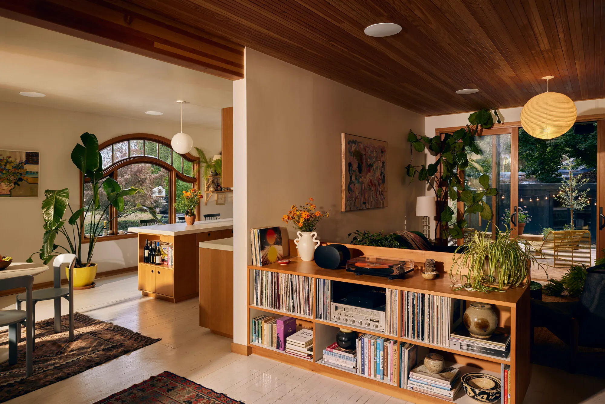 Living space with discreet ceiling speakers and vinyl collection